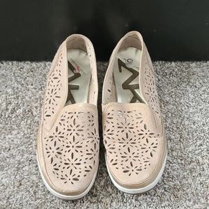 AK tan hole slip ons